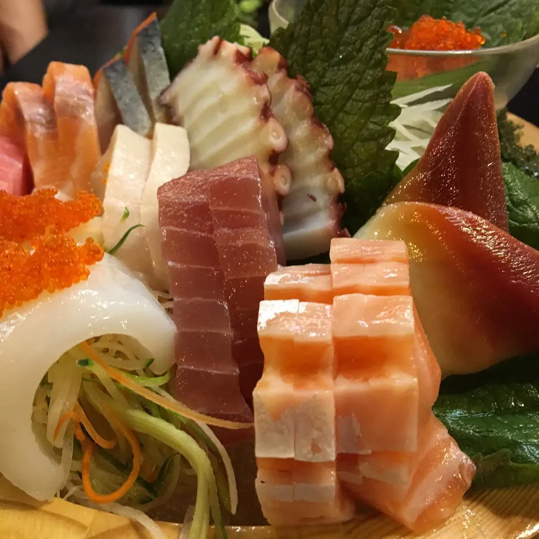 A platter of sashimi with salmon, tuna, octopus and fish roe, in Saigon